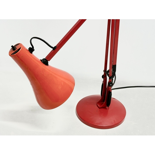 211 - A red model 90 anglepoise lamp.