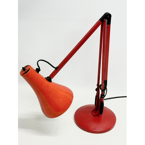 211 - A red model 90 anglepoise lamp.