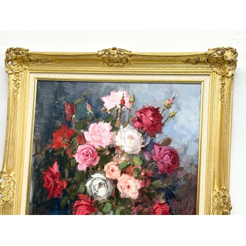 122 - A large signed Dutch Still Life oil painting on canvas in a good quality ornate gilt frame. 59x79cm.... 