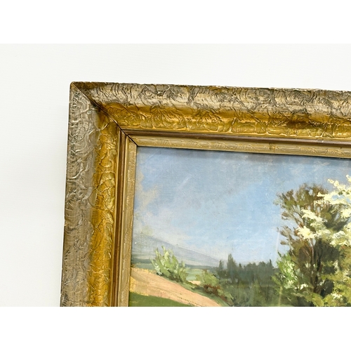 123 - A signed continental oil painting on board and a gilt frame. 48x37cm. Frame 65x53cm