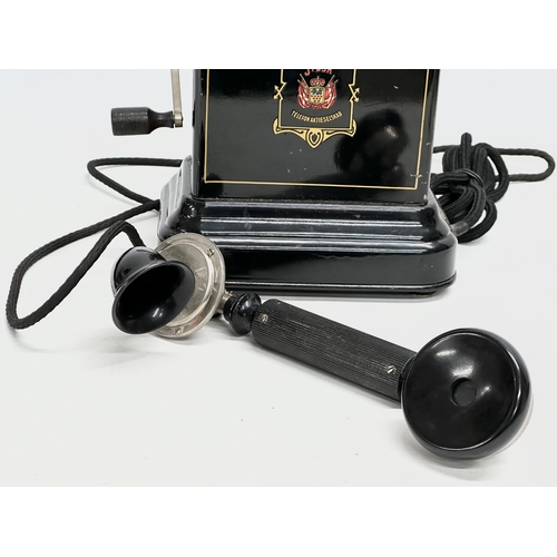 116 - An early 20th century Jydsk telephone (Telefon Aktieselskab) 33cm