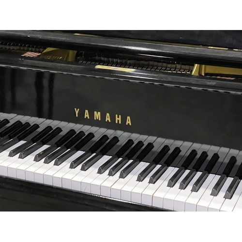 1152 - A Yamaha G1 Baby Grand Piano. RE 4638787.