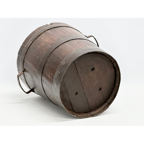 108 - A Victorian oak bucket. 36x30x30.5cm