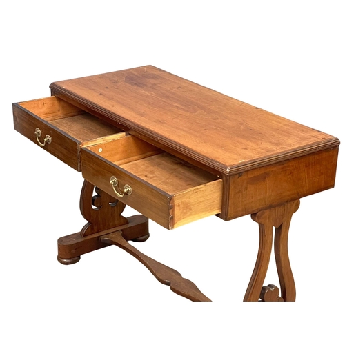 1164 - A Victorian mahogany side table with 2 drawers. 104x47.5x77.5cm (11)