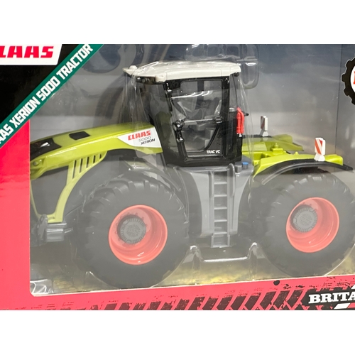 598 - An unused Britains Claas Xerion 5000 Tractor in box. Die-Cast Model and Plastic Parts. 29x15x17cm