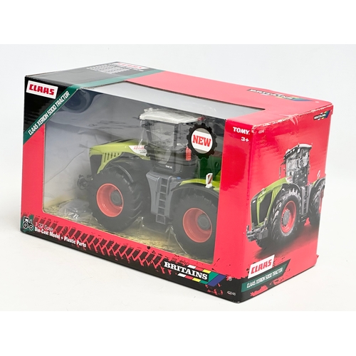 598 - An unused Britains Claas Xerion 5000 Tractor in box. Die-Cast Model and Plastic Parts. 29x15x17cm