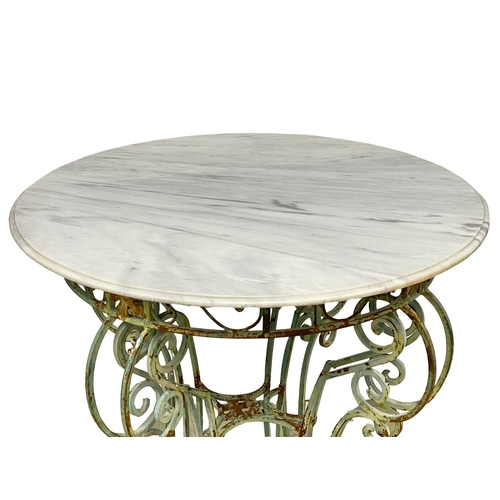 1172 - A large late 19th century French wrought iron garden centre table with marble top. 101x99.5cm (11)