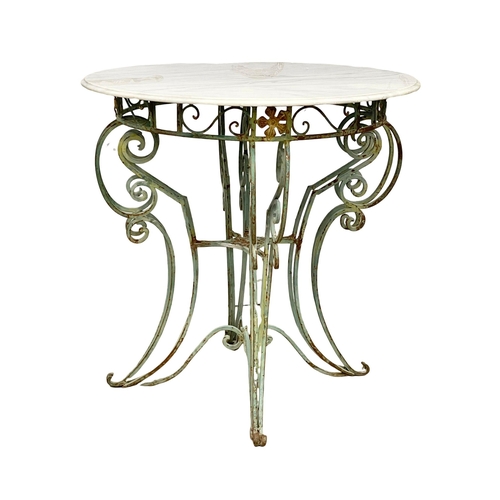 1172 - A large late 19th century French wrought iron garden centre table with marble top. 101x99.5cm (11)