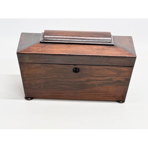 109 - A Regency rosewood sarcophagus tea caddy. Circa 1810. 28x14x16cm