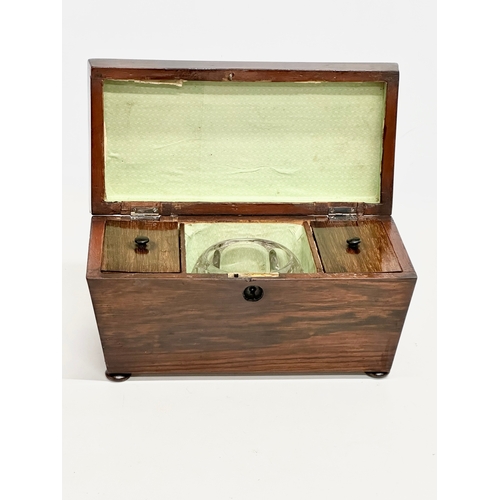 109 - A Regency rosewood sarcophagus tea caddy. Circa 1810. 28x14x16cm