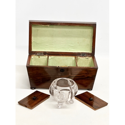 109 - A Regency rosewood sarcophagus tea caddy. Circa 1810. 28x14x16cm