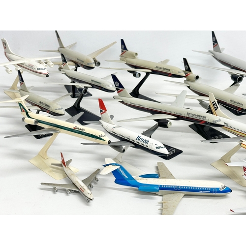 399 - A collection of model airplanes. British Airways, Aer Lingus, Alitalia,. 26x27cm