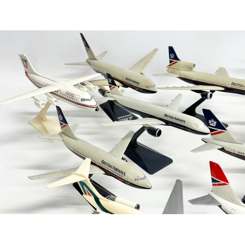 399 - A collection of model airplanes. British Airways, Aer Lingus, Alitalia,. 26x27cm