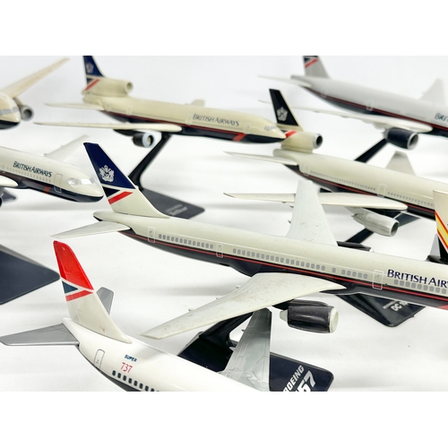 399 - A collection of model airplanes. British Airways, Aer Lingus, Alitalia,. 26x27cm