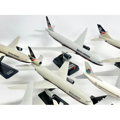 399 - A collection of model airplanes. British Airways, Aer Lingus, Alitalia,. 26x27cm