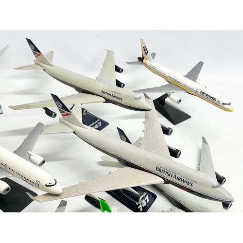 399 - A collection of model airplanes. British Airways, Aer Lingus, Alitalia,. 26x27cm