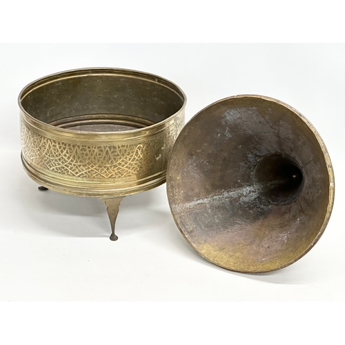 194 - A large early 20th century Moroccan brass Tajine dish with cover. 34x69cm