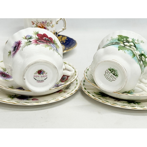 299G - A collection of tea cups and saucers. A Hammersley & Co gilt and flower motif pattern (damaged) a Ro... 