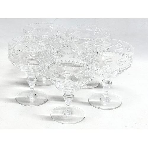 299J - 4 sets of crystal coupe glasses.