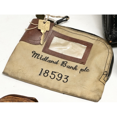 211K - 8 vintage Midland Bank and Westminster Bank leather safe bags.