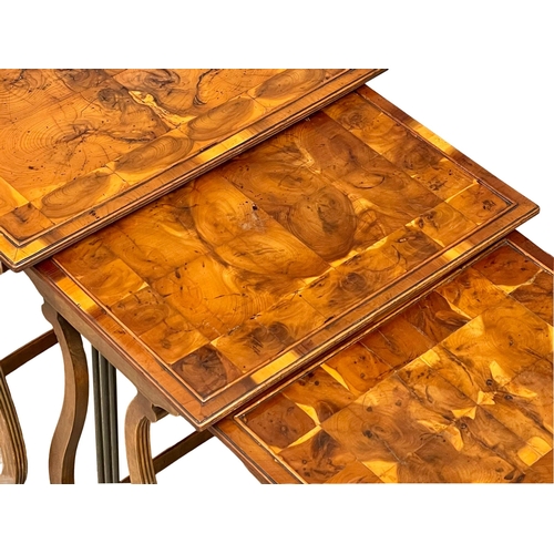 920A - A good quality vintage Georgian style Oyster Yew Wood nest of tables. (5)