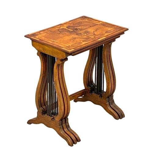 920A - A good quality vintage Georgian style Oyster Yew Wood nest of tables. (5)