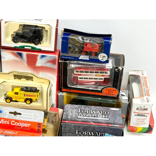 645 - A large collection of model cars and trucks etc.