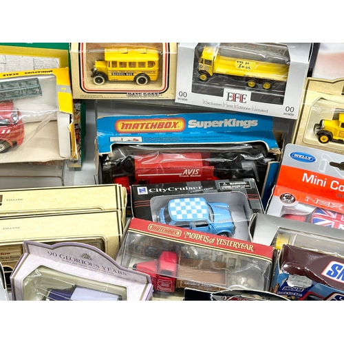 645 - A large collection of model cars and trucks etc.