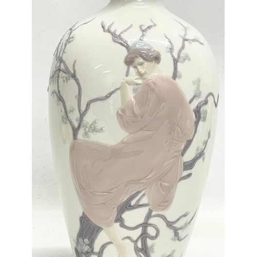 105B - A Lladro ‘Tree of Life’ porcelain vase. 29.5cm