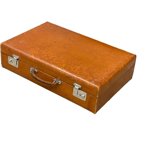 241D - 4 good quality early 20th century leather cases.