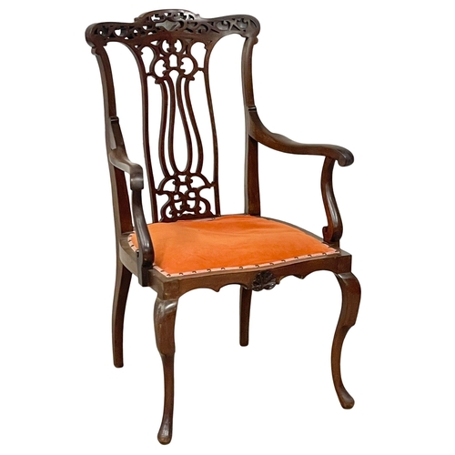 1002 - An Edwardian mahogany parlour chair. (2)