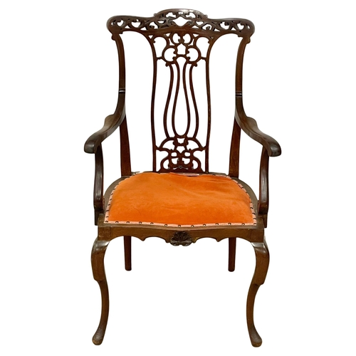 1002 - An Edwardian mahogany parlour chair. (2)