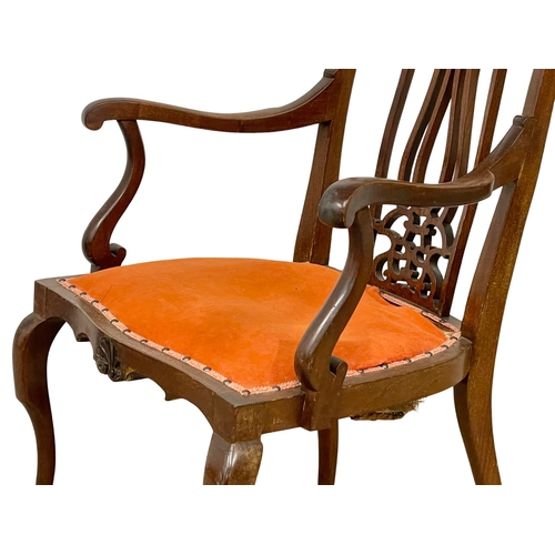 1002 - An Edwardian mahogany parlour chair. (2)