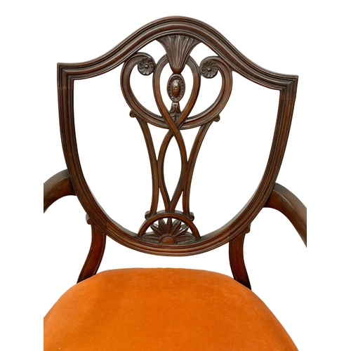 1003 - An early 20th century Hepplewhite style mahogany parlour chair. Circa 1900-1910. (2)