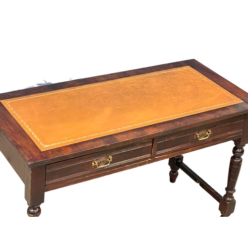 1011 - A late Victorian writing table with leather top and 2 drawers. Circa 1890. 108x51x69cm (3)