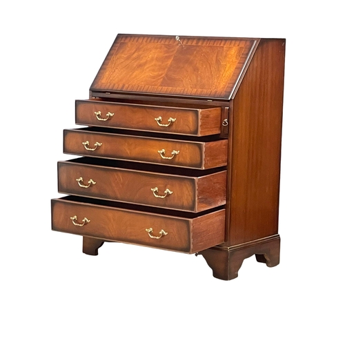 1014 - A George III style mahogany writing bureau. 78.5x41x99.5cm (3)