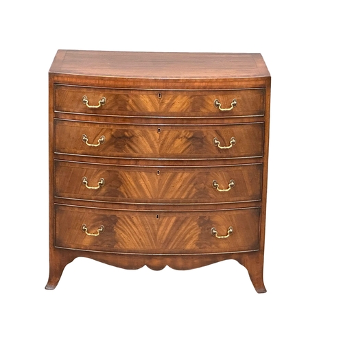 1022A - A good quality fine proportioned late 19th century George III style inlaid mahogany bow front chest ... 