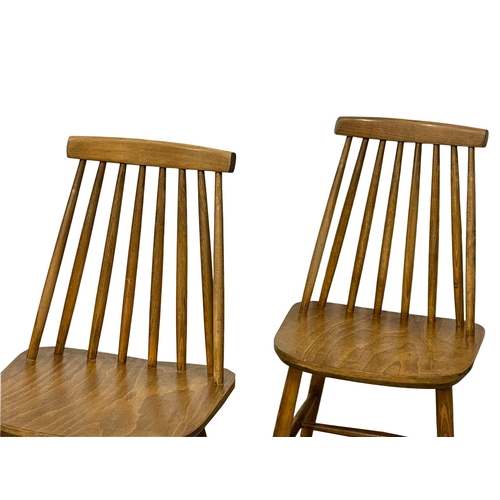 1038 - A set of 4 Danish Mid Century kitchen chairs by Farstrup. (8)