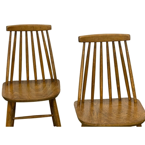 1038 - A set of 4 Danish Mid Century kitchen chairs by Farstrup. (8)