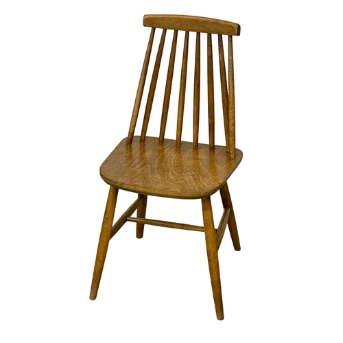 1038 - A set of 4 Danish Mid Century kitchen chairs by Farstrup. (8)