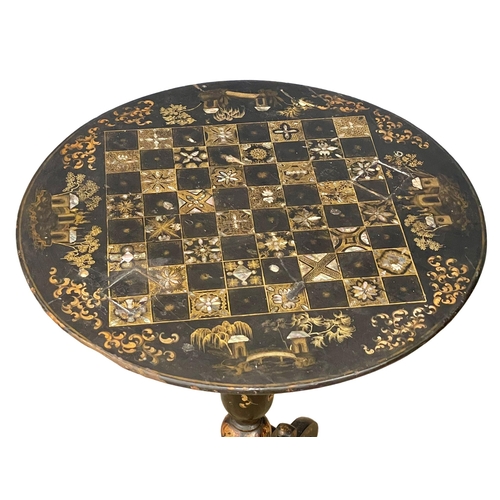 1045 - A Victorian hand painted lacquered pedestal table with chinoiserie decoration. 57x72cm (4)