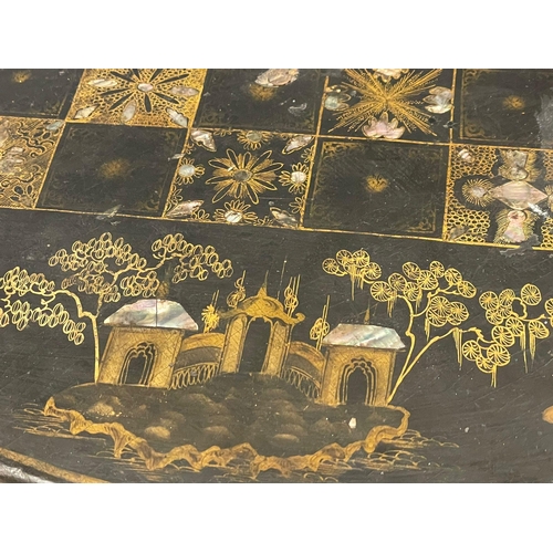 1045 - A Victorian hand painted lacquered pedestal table with chinoiserie decoration. 57x72cm (4)