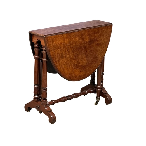 1060 - A Victorian mahogany Sutherland table on brass cup casters. Open 104x80x74cm. Closed 21.5x80x74cm (5... 