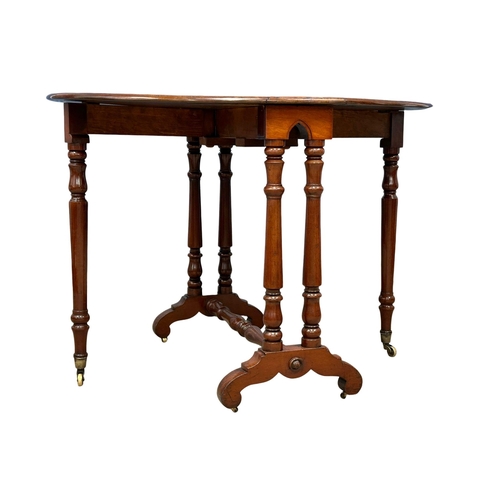 1060 - A Victorian mahogany Sutherland table on brass cup casters. Open 104x80x74cm. Closed 21.5x80x74cm (5... 