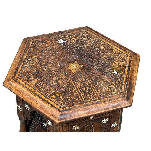 1061 - A late 19th century Burmese carved teak end table with bone inlay. Circa 1880-1890. 39.5x53cm (6)