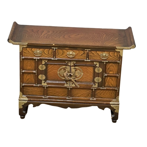 1068 - A Korean style brass bound elm cabinet. 71x48x31cm (5)