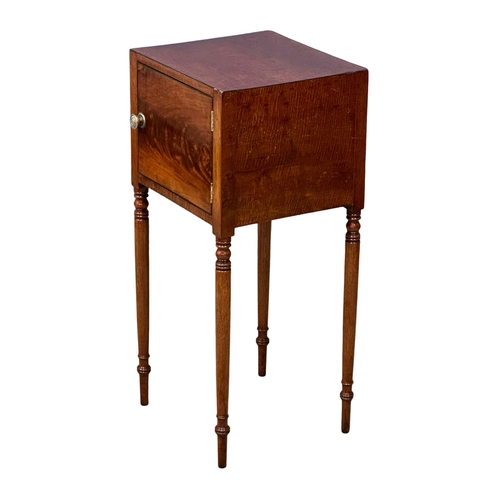 1074 - A George IV mahogany pot cupboard/ bedside cabinet. Circa 1820. 36x33x77.5cm (3)