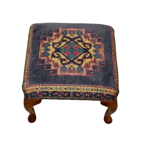 1078 - A modern Middle Eastern style upholstered footstool on solid beech Queen Anne legs. 48x48x34cM (2)