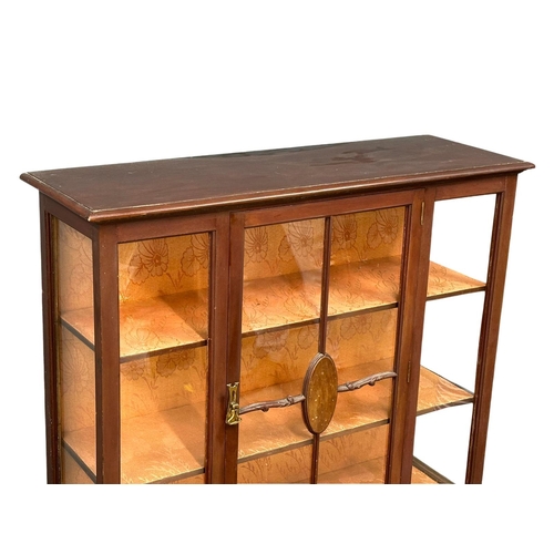 1084 - An early 20th century mahogany display cabinet with 3 drawers on Ball & Claw feet. Circa 1900-1920. ... 