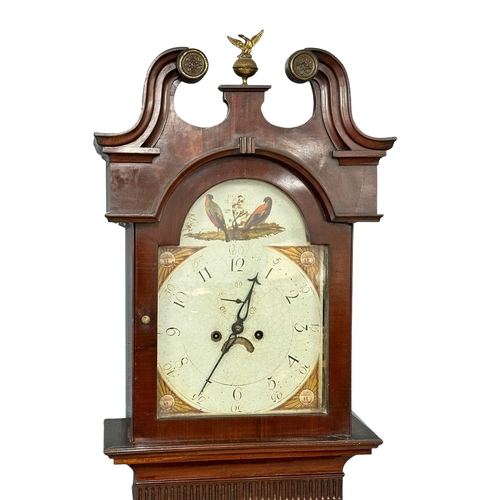 1085 - A George III inlaid mahogany long case clock with painted dial and reeded half columns on bracket fe... 